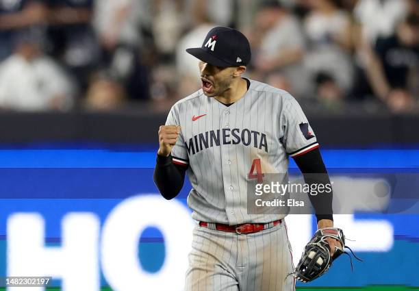 Carlos Correa of the Minnesota Twins celebrates after he caught the final out of the game against the New York Yankees at Yankee Stadium on April 14,...