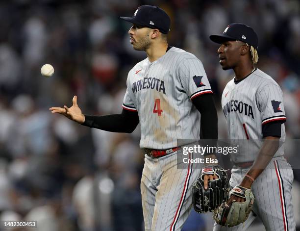 Nick Gordon and Carlos Correa of the Minnesota Twins celebrate the win over the New York Yankees at Yankee Stadium on April 14, 2023 in the Bronx...