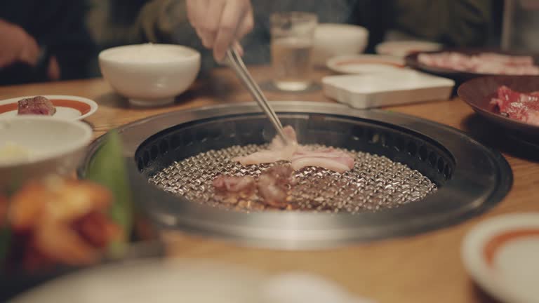 https://media.gettyimages.com/id/1482304863/video/beef-slice-for-japanese-style-yakiniku-food-barbecue-and-grilled-over-charcoal-on-stove-in.jpg?b=1&s=640x640&k=20&c=7Wkjwq5DTLrFJSNd-TPWxgWkBUa3i0M52tOoQVTvnqc=
