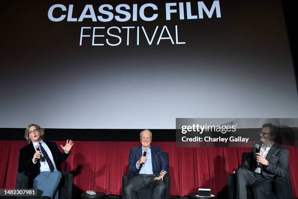 Alexander Payne, George Stevens Jr., and TCM host Ben Mankiewicz speaks onstage during the screening of "Penny Serenade" during the 2023 TCM Classic...