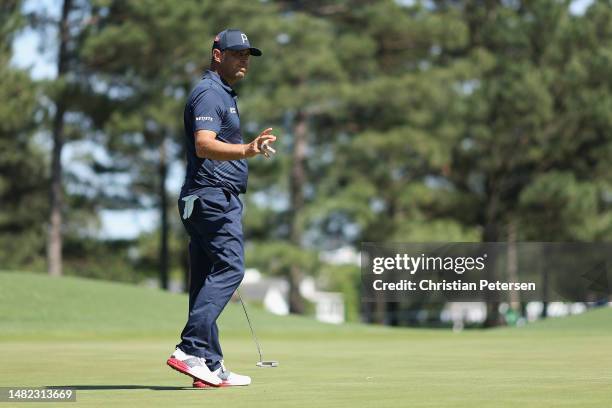 Gary Woodland of the United States reacts to his putt on the eighth green during the final round of the 2023 Masters Tournament at Augusta National...