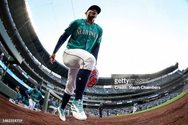 Julio Rodriguez of the Seattle Mariners takes the field before the game against the Colorado Rockies at T-Mobile Park on April 14, 2023 in Seattle,...