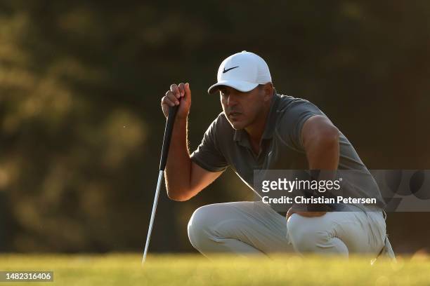 Brooks Koepka of the United States putts on the 17th green during the final round of the 2023 Masters Tournament at Augusta National Golf Club on...