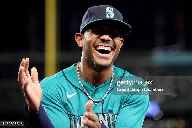 Julio Rodriguez of the Seattle Mariners celebrates his team's 5-3 win against the Colorado Rockies at T-Mobile Park on April 14, 2023 in Seattle,...