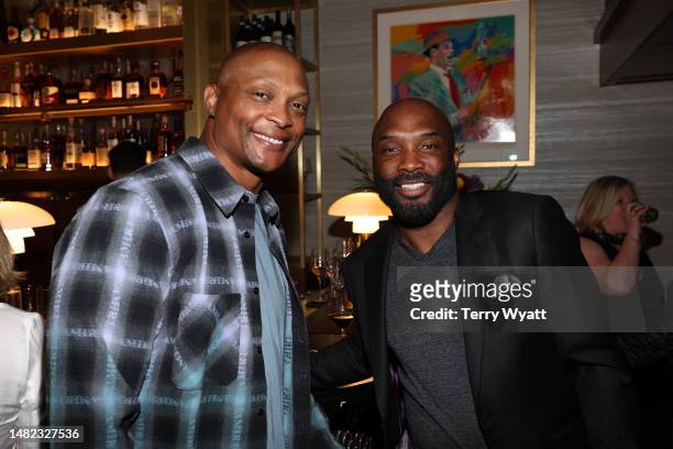 Former Tennessee Titans player Eddie George and Derrick Mason attend the grand opening of Sinatra Bar & Lounge at Sinatra Bar & Lounge on April 14,...