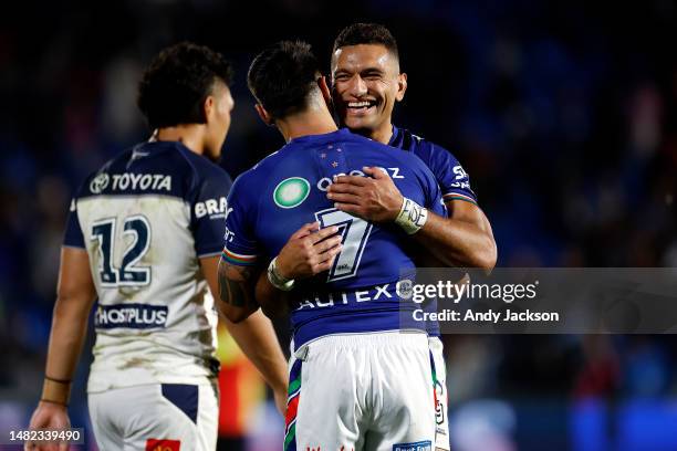 Shaun Johnson of the Warriors & Marcelo Montoya of the Warriors celebrate the win during the round seven NRL match between New Zealand Warriors and...