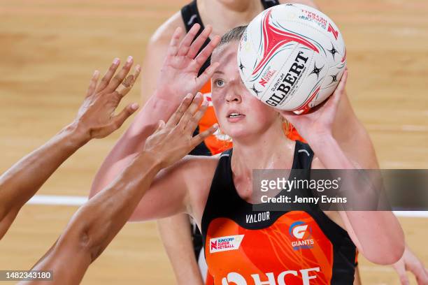 Sophie Dwyer of the Giants shoots a supershot during the round five Super Netball match between Giants Netball and Collingwood Magpies at Ken...