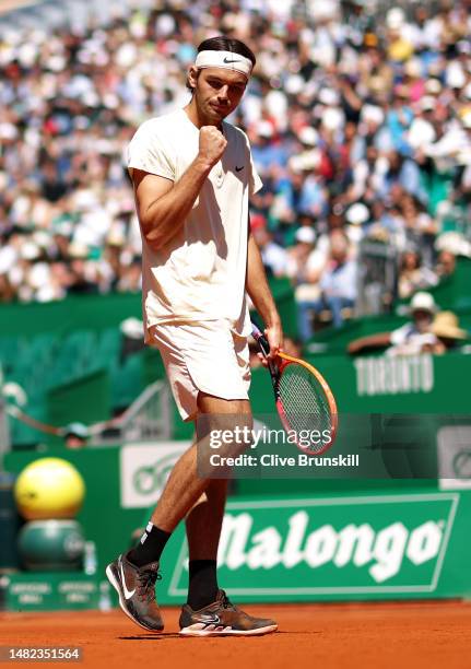 Taylor Fritz of the United States celebrates a point against Stefanos Tsitsipas of Greece in their quarterfinal match during day six of the Rolex...