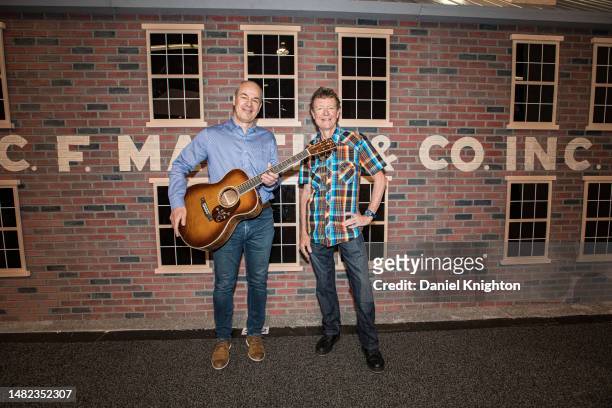 Martin & Co. President & CEO Thomas Ripsam and Executive Chairman Chris Martin pose with the new CEO-10 guitar during The 2023 NAMM Show at Anaheim...