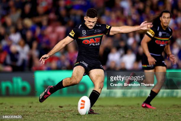 Nathan Cleary of the Panthers kicks the winning field goal in golden point during the round seven NRL match between Newcastle Knights and Penrith...