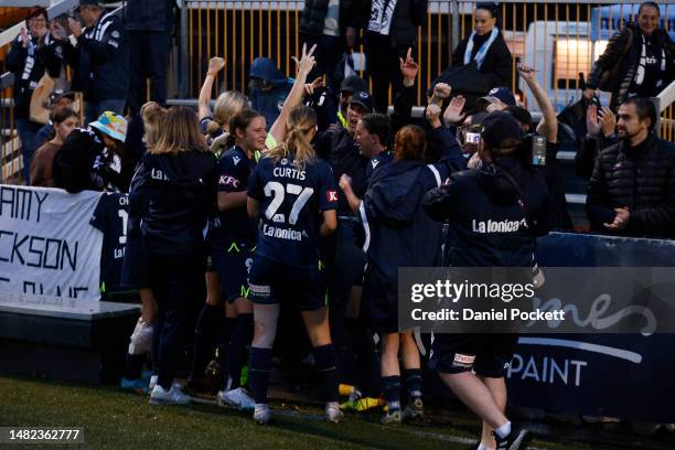 Melbourne Victory celebrate with fans after winning the penalty shootout to decide the A-League Women's Semi Final match between Melbourne City and...