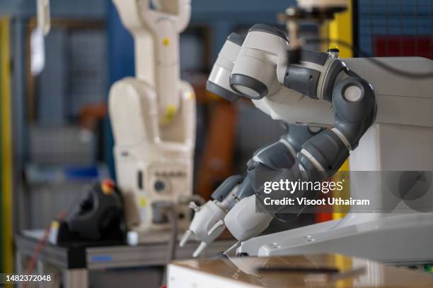 Arm Operating System Robotic Arm Operating In Modern Industrial Factory High-Res Stock Photo ...
