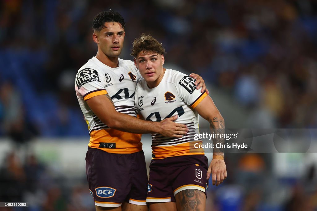 Jesse Reece Jesse Arthars and Reece Walsh of the Broncos celebrate winning during ...