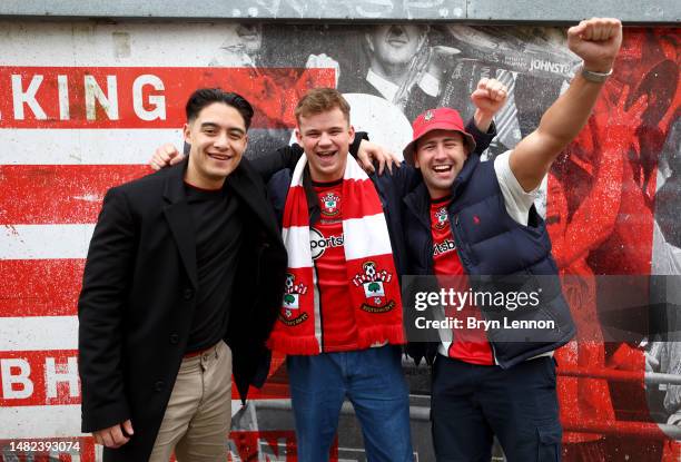 Southampton fans pose for a photo outside the stadium prior to the Premier League match between Southampton FC and Crystal Palace at Friends...