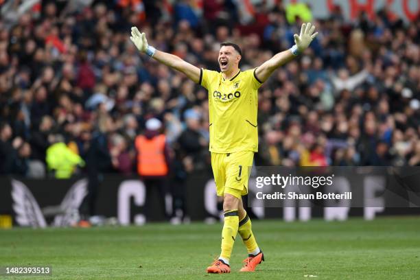 Emiliano Martinez of Aston Villa celebrates after teammate Ollie Watkins scores the team's third goal during the Premier League match between Aston...