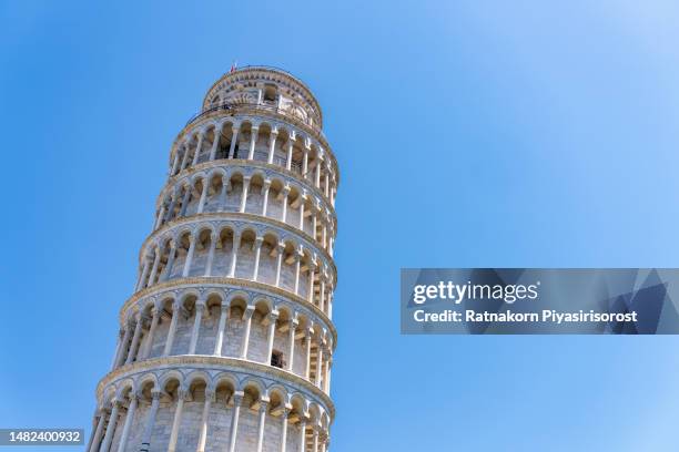 the leaning tower in a sunny day in pisa, italy. - pisa stock pictures, royalty-free photos & images