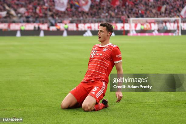 Benjamin Pavard of FC Bayern Munich celebrates after scoring the team's first goal during the Bundesliga match between FC Bayern München and TSG...