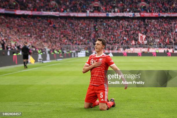 Benjamin Pavard of FC Bayern Munich celebrates after scoring the team's first goal during the Bundesliga match between FC Bayern München and TSG...