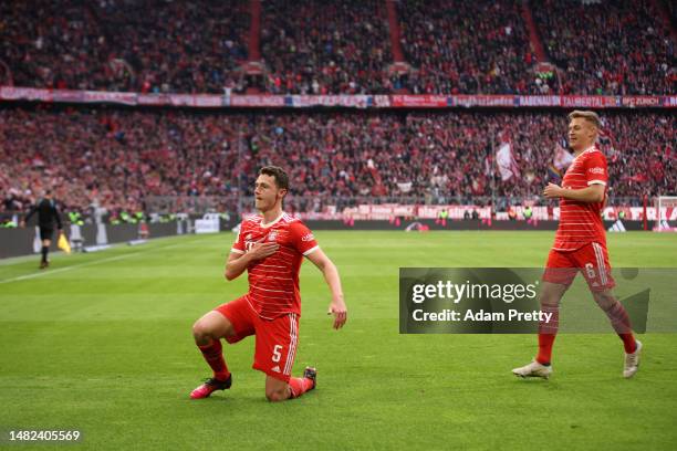 Benjamin Pavard of FC Bayern Munich celebrates after scoring the team's first goal during the Bundesliga match between FC Bayern München and TSG...