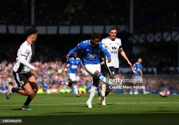 Demarai Gray of Everton shoots during the Premier League match between Everton FC and Fulham FC at Goodison Park on April 15, 2023 in Liverpool,...