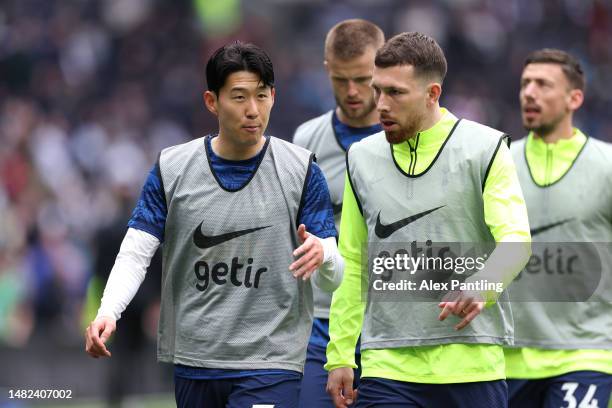 Son Heung-Min and Pierre-Emile Hojbjerg of Tottenham Hotspur warm up prior to the Premier League match between Tottenham Hotspur and AFC Bournemouth...