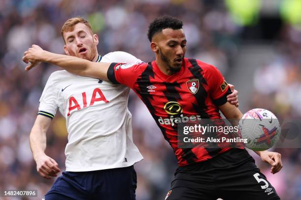 Dejan Kulusevski of Tottenham Hotspur battles for possession with Lloyd Kelly of AFC Bournemouth during the Premier League match between Tottenham...