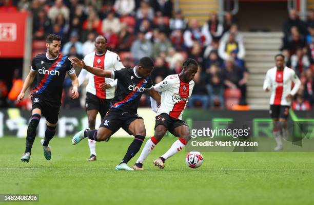 Kamaldeen Sulemana of Southampton and Cheick Doucoure of Crystal Palace during the Premier League match between Southampton FC and Crystal Palace at...