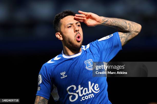 Dwight McNeil of Everton celebrates after scoring the team's first goal during the Premier League match between Everton FC and Fulham FC at Goodison...