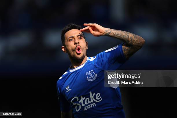 Dwight McNeil of Everton celebrates after scoring the team's first goal during the Premier League match between Everton FC and Fulham FC at Goodison...