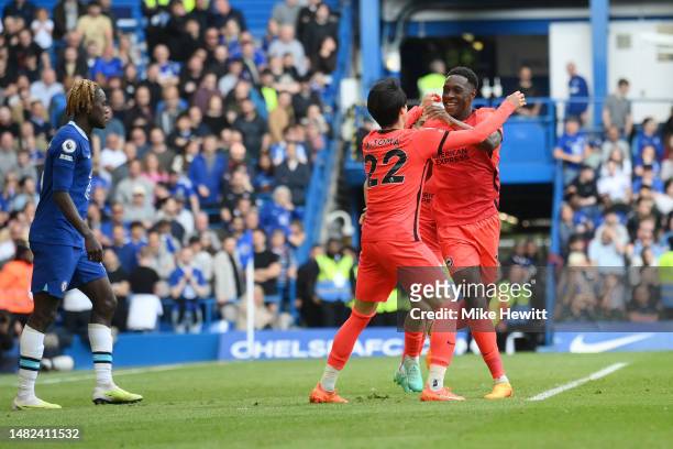 Danny Welbeck of Brighton & Hove Albion celebrates after scoring the team's first goal during the Premier League match between Chelsea FC and...