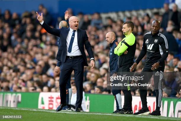 Sean Dyche, Manager of Everton, reacts towards Luis Boa Morte, Assistant Manager of Fullham during the Premier League match between Everton FC and...