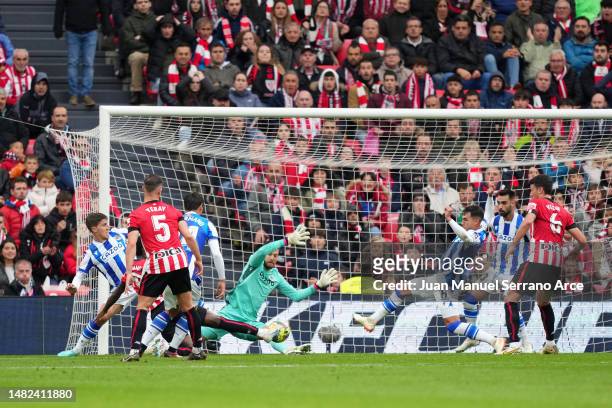 Inaki Williams of Athletic Club scores the team's first goal past Alejandro Remiro of Real Sociedad during the LaLiga Santander match between...