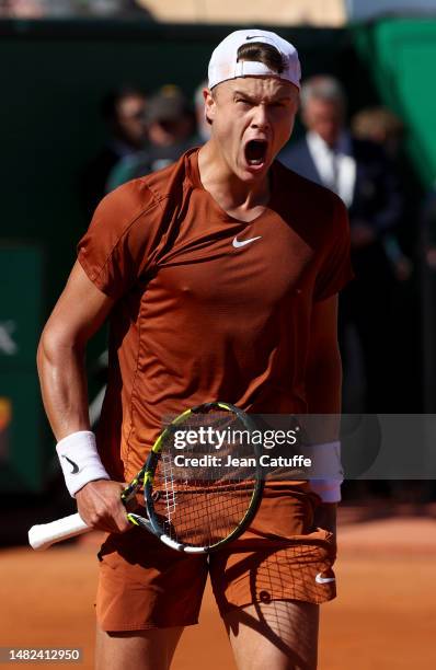 Holger Rune of Denmark celebrates his victory against Daniil Medvedev of Russia during day 6 of the Rolex Monte-Carlo Masters 2023, an ATP Masters...