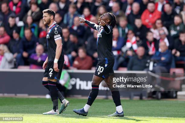 Eberechi Eze of Crystal Palace celebrates alongside teammate Joel Ward after scoring the team's first goal during the Premier League match between...