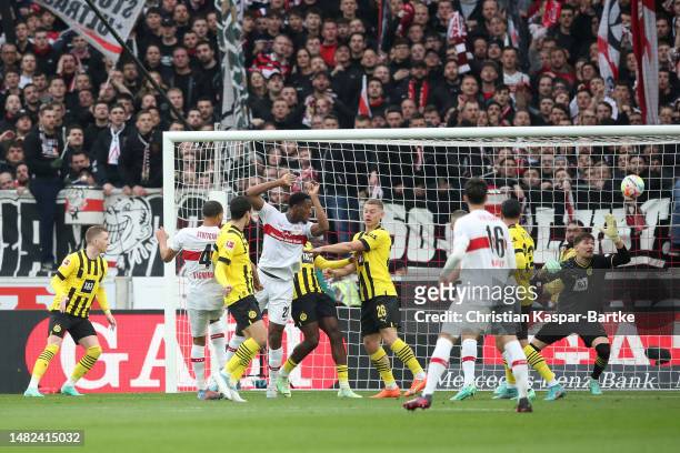 Josha Vagnoman of VfB Stuttgart scores the team's second goal past Gregor Kobel of Borussia Dortmund during the Bundesliga match between VfB...
