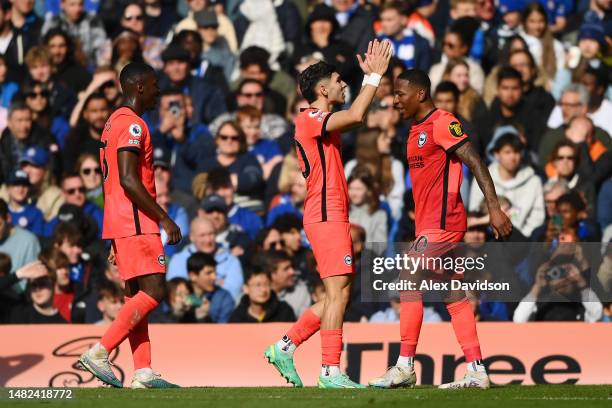 Julio Enciso of Brighton & Hove Albion celebrates after scoring the team's second goal during the Premier League match between Chelsea FC and...