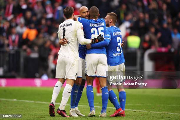 Oliver Baumann, John Brooks, Kevin Akpoguma and Pavel Kaderabek of TSG Hoffenheim react following the Bundesliga match between FC Bayern München and...