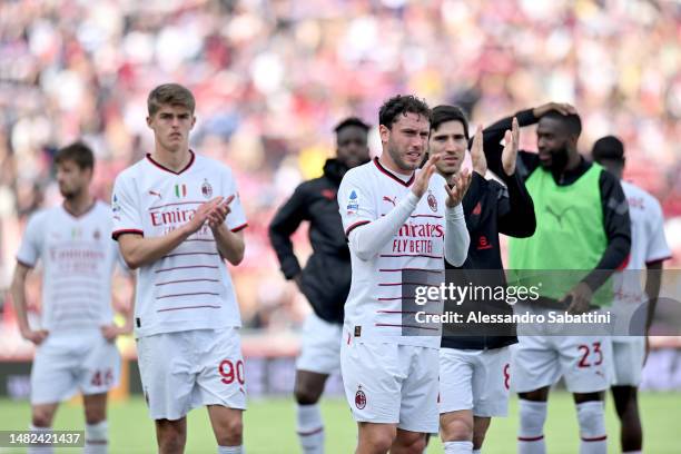 Davide Calabria of AC Milan applauds the fans following the Serie A match between Bologna FC and AC Milan at Stadio Renato Dall'Ara on April 15, 2023...
