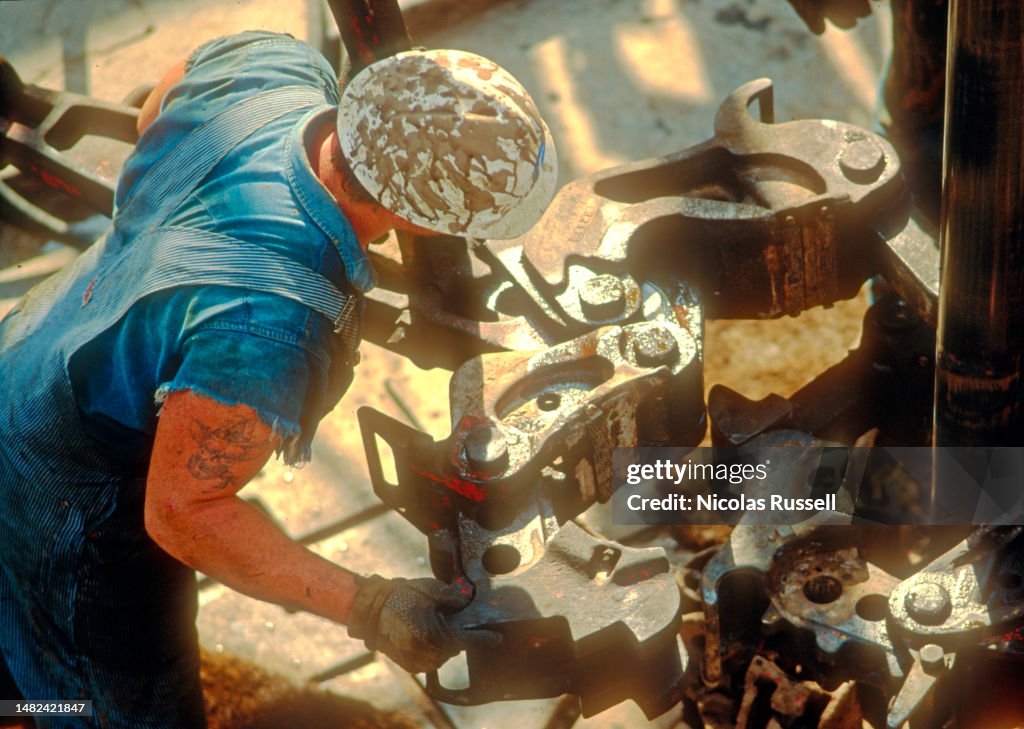 Woman Roughneck Rig A Roughneck Working Tongs On An Offshore Drilling Rig In The Gulf Of ...