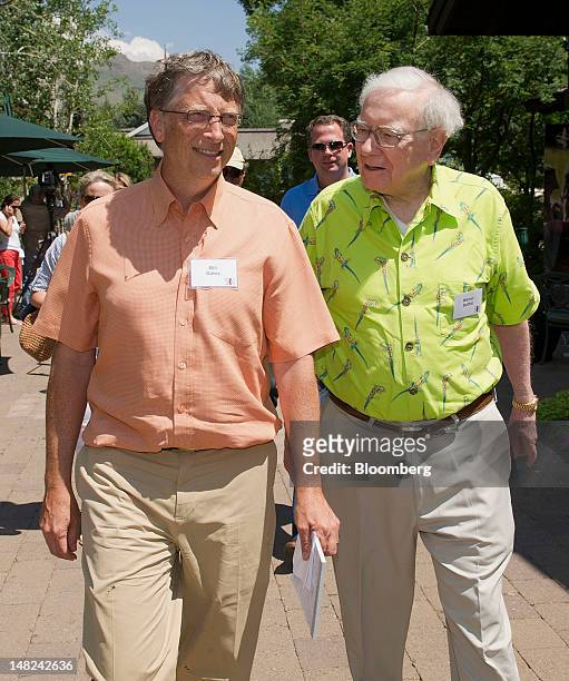 Bill Gates, chairman and founder of Microsoft Corp., left, and Warren Buffett, chairman of Berkshire Hathaway Inc., walk the grounds during the Allen...