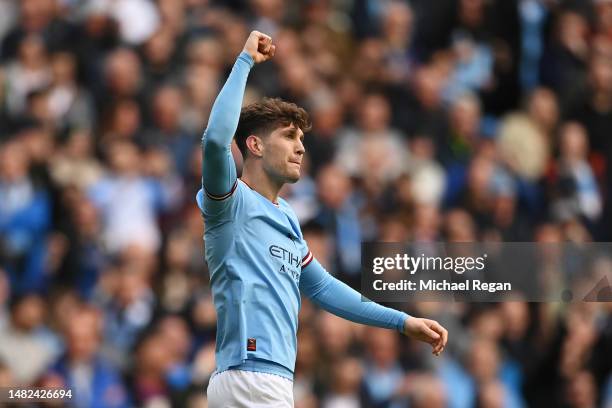 John Stones of Manchester City celebrates after scoring the team's first goal during the Premier League match between Manchester City and Leicester...