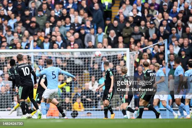 John Stones of Manchester City scores the team's first goal during the Premier League match between Manchester City and Leicester City at Etihad...