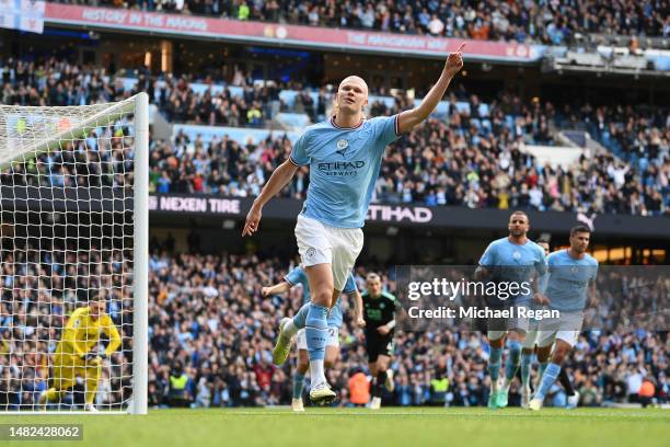 Erling Haaland of Manchester City celebrates after scoring the team's second goal from the penalty spot during the Premier League match between...