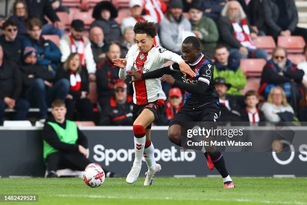 Samuel Edozie of Southampton and Tyrick Mitchell of Crystal Palace during the Premier League match between Southampton FC and Crystal Palace at St....