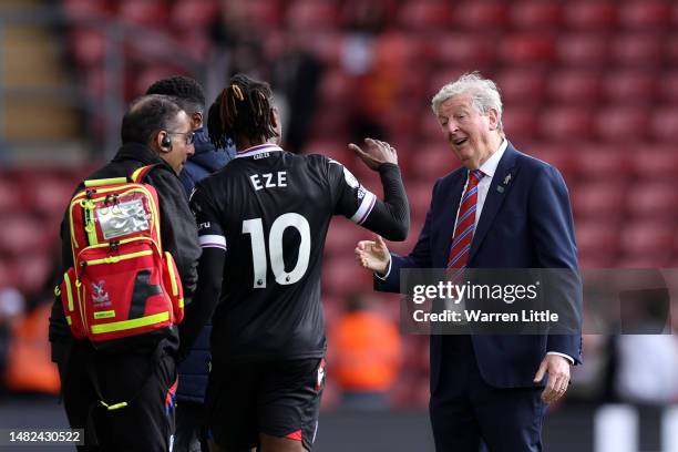 Roy Hodgson, Manager of Crystal Palace, shakes hands with Eberechi Eze after the team's victory in the Premier League match between Southampton FC...