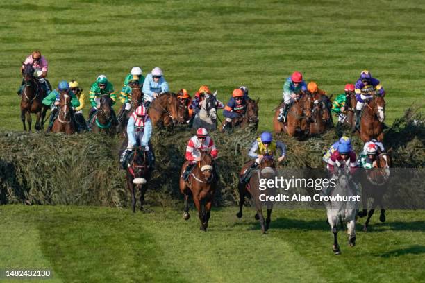 Derek Fox riding Corach Rambler clear the 'Chair' before going on to win The Randox Grand National Handicap Chase on Grand National Day during day...