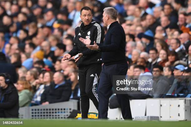 John Terry and Dean Smith, Manager of Leicester City, react during the Premier League match between Manchester City and Leicester City at Etihad...