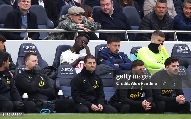 Davinson Sanchez of Tottenham Hotspur reacts on the bench after being substituted during the Premier League match between Tottenham Hotspur and AFC...