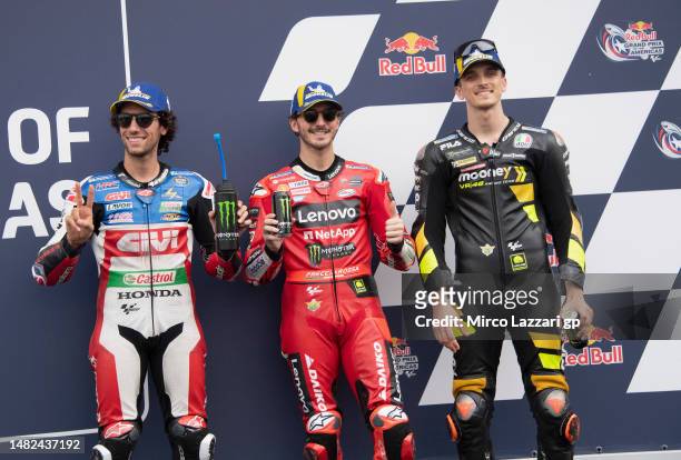 Alex Rins of Spain and LCR Honda Castrol , Francesco Bagnaia of Italy and Ducati Lenovo Team and Luca Marini of Italy and Mooney VR46 Racing Team...