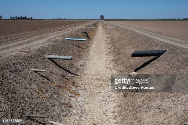 Completely dry agricultural flow, exposing the pipes where the pastures should be irrigated on April 15, 2023 in Jerez de la Frontera, Spain. With an...